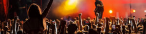 Crowd header image with their fists lifted