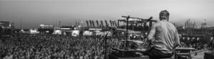 Black and white drummer photo from stage